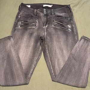 Torrid Gray Skinny Jeans with Edgy Distressed Style